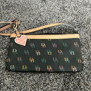 Dooney & Bourke signature dual strap wristlet with charm